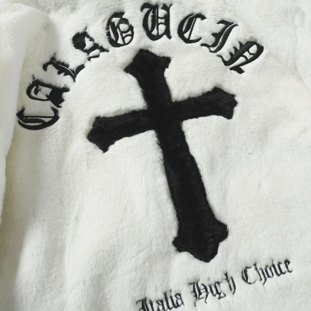 White. A black cross and text on a white background.