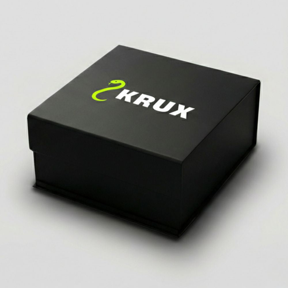 Black box with 'KRUX' logo on a light gray background