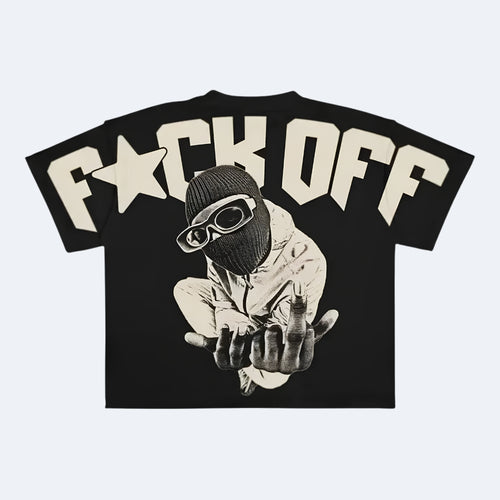 A black short-sleeve graphic t-shirt featuring the text 'F*CK OFF' in a bold cream-colored font across the chest, with a central graphic of a person in a black balaclava and goggles making a hand gesture.
