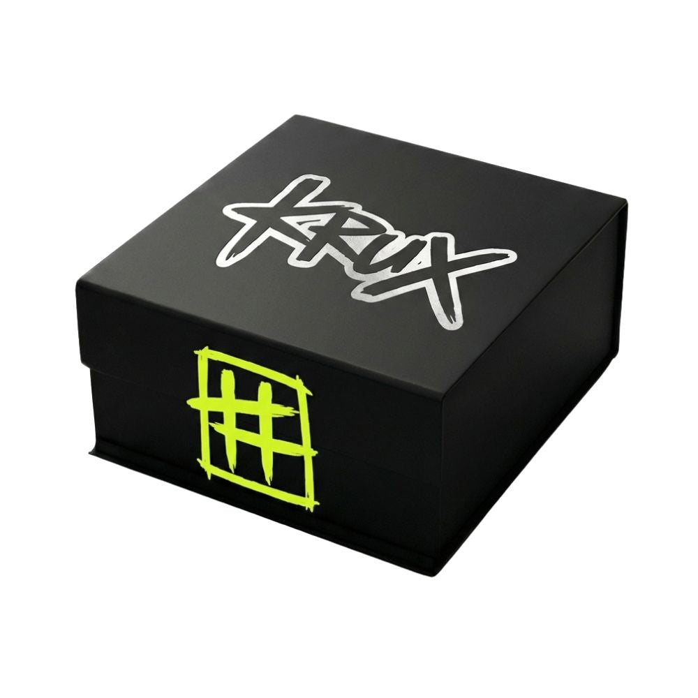 Black box with white and green designs on a white background