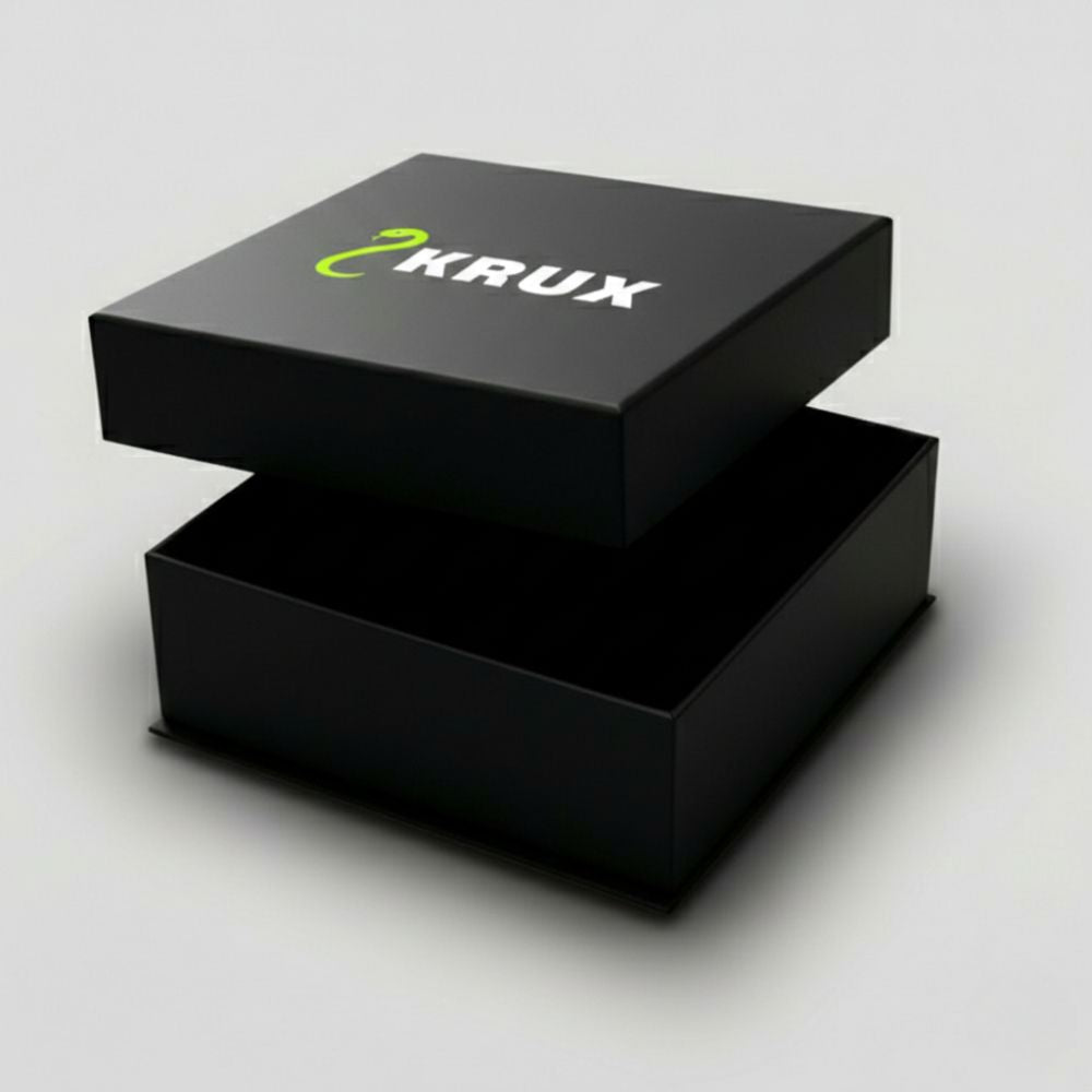 Black open box with 'KRUX' branding on a light gray background