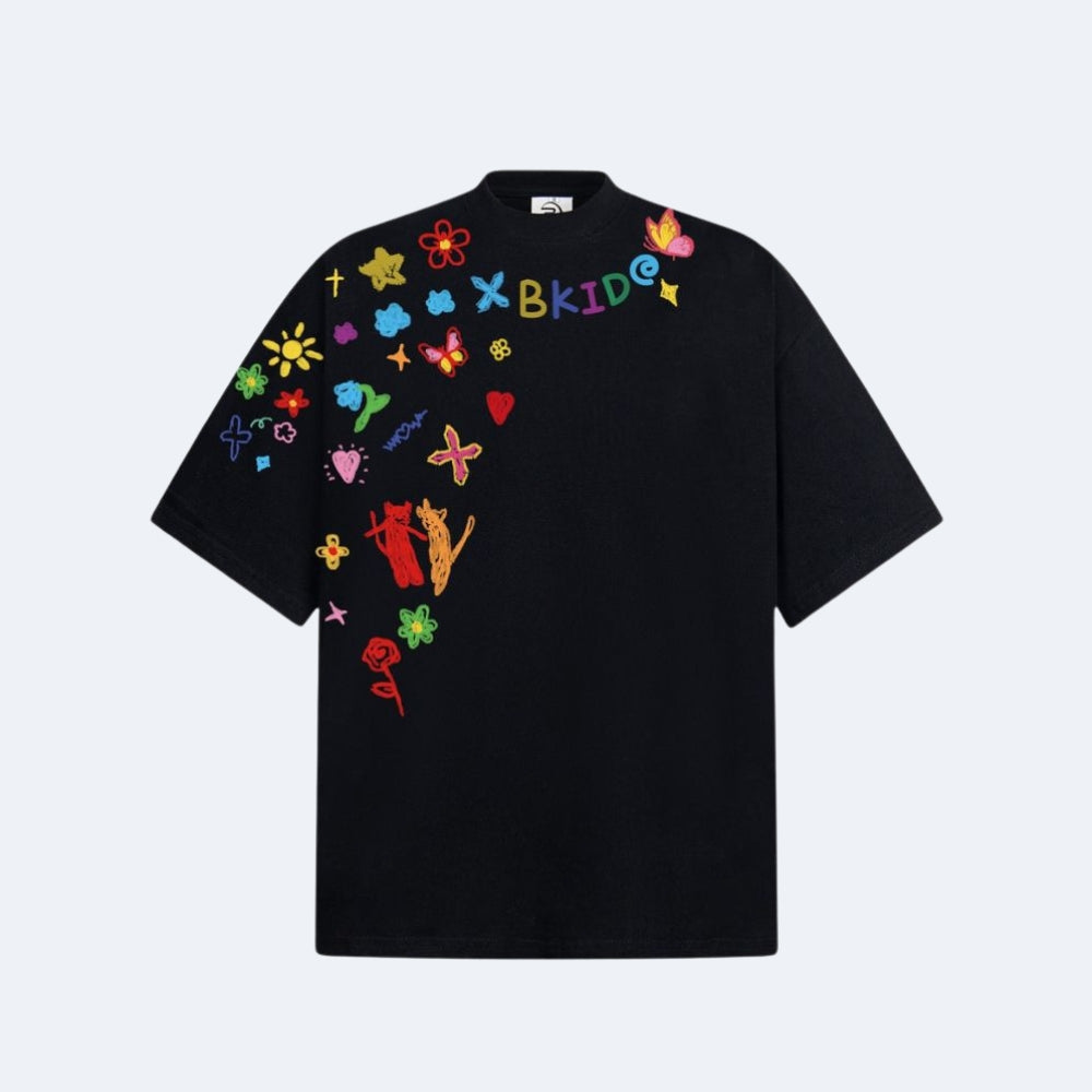 Black. A black short-sleeve t-shirt featuring colorful embroidered patches and text across the chest.