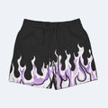 Purple. Black athletic shorts featuring a purple and white flame gradient print along the bottom hem, with a black drawstring waistband.