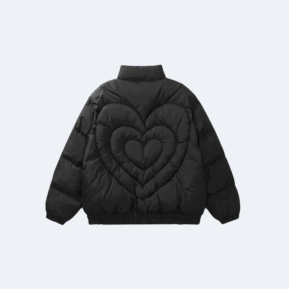 Black. A black puffer jacket shown from the back, featuring a large quilted heart design on the back panel.