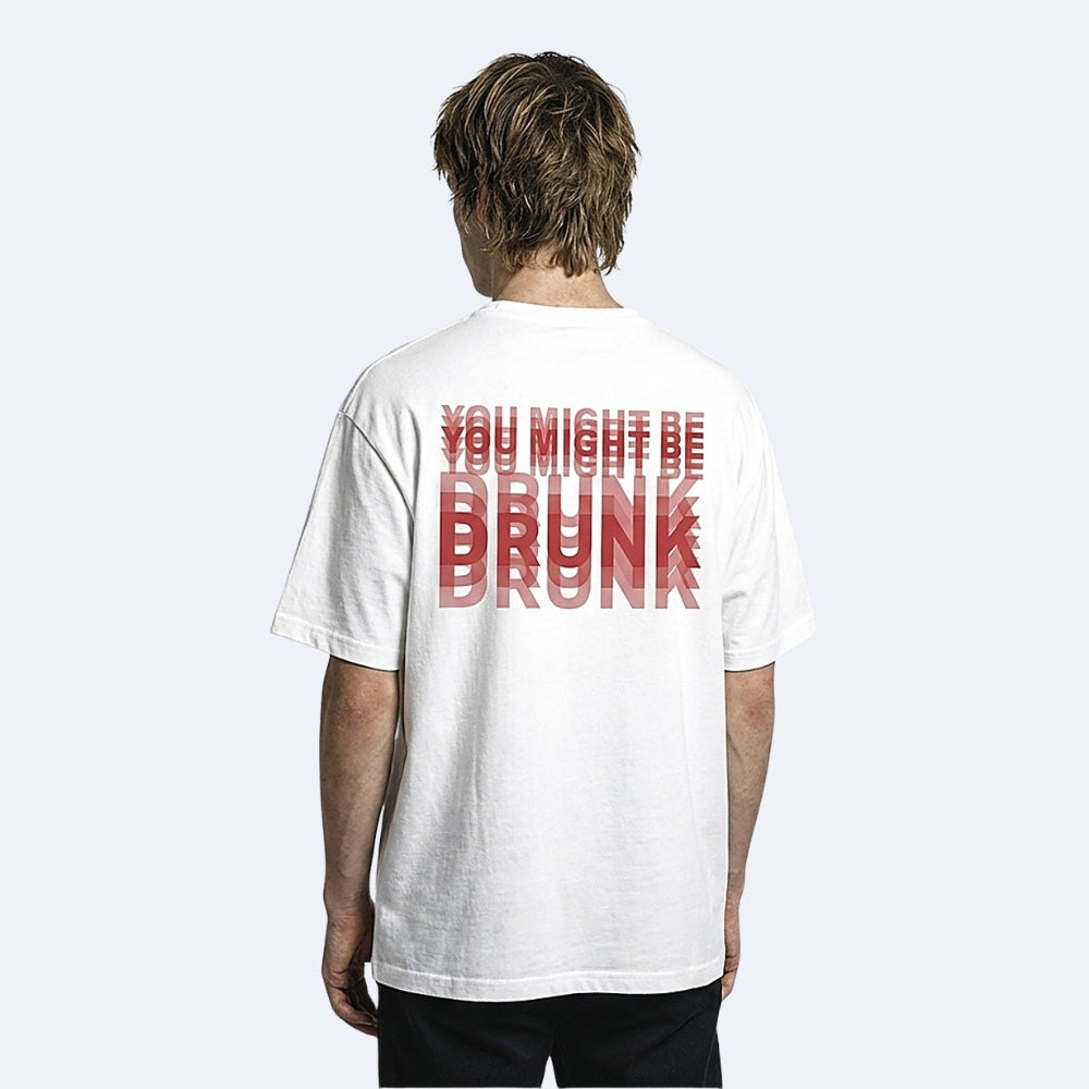 White. KRUX You Might Be Drunk white oversized tee with red DRUNK back print, shown on a model